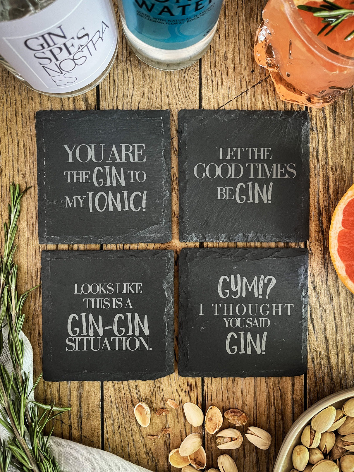 Slate gin coasters with various designs - set of 4