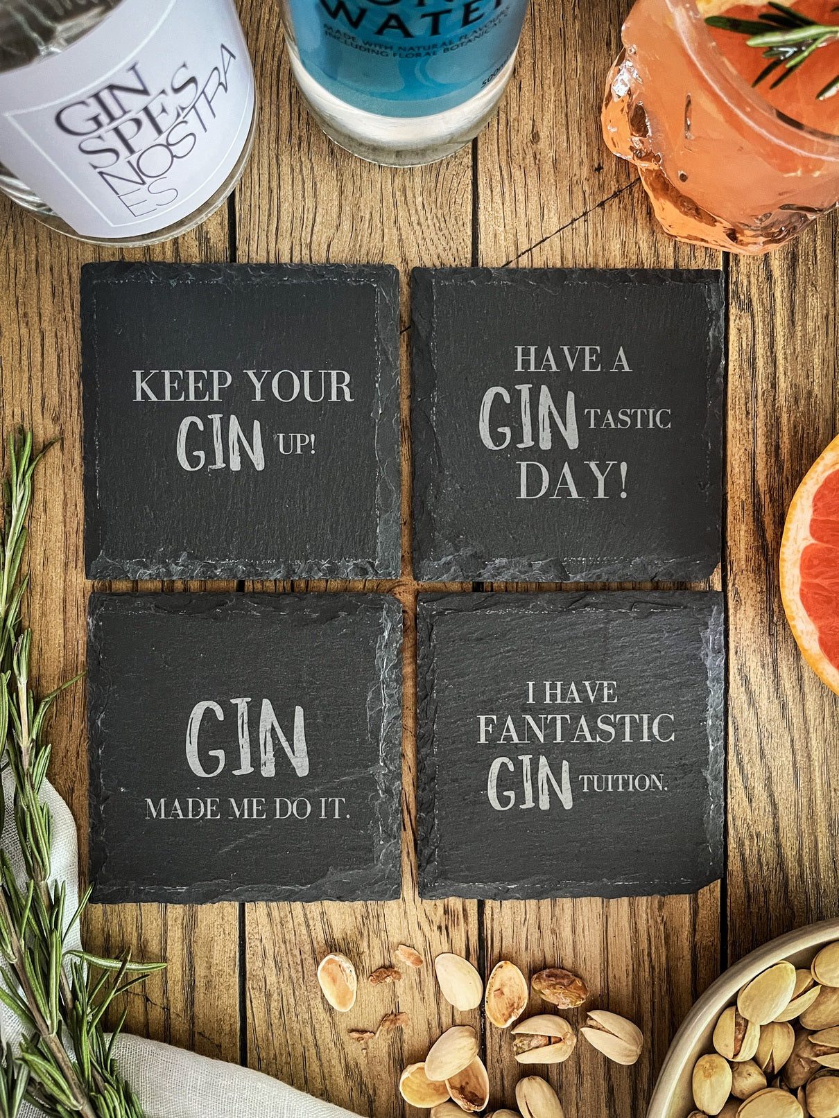 Slate gin coasters with various designs - set of 4